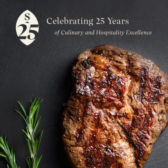 large cooked steak and the words celebrating 25 years of culinary hospitality